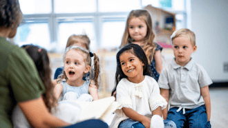 children listening to a book being read