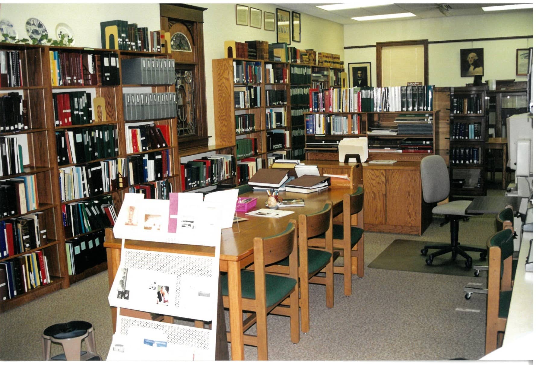 Local History Room books on shelves, tables and chairs, 