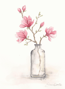 pink magnolia stem in a vase