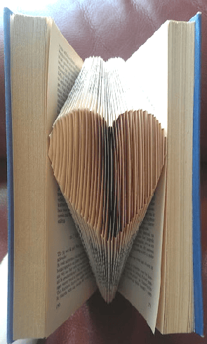 book pages fold into heart